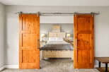 Step into a world of rustic elegance with this stunning bedroom.