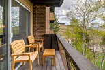 Enjoy breathtaking views from this charming balcony.