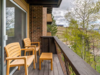 Enjoy breathtaking views from this charming balcony.