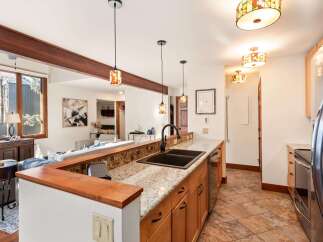 Step into this stunning kitchen, boasting a seamless blend of style and functionality.