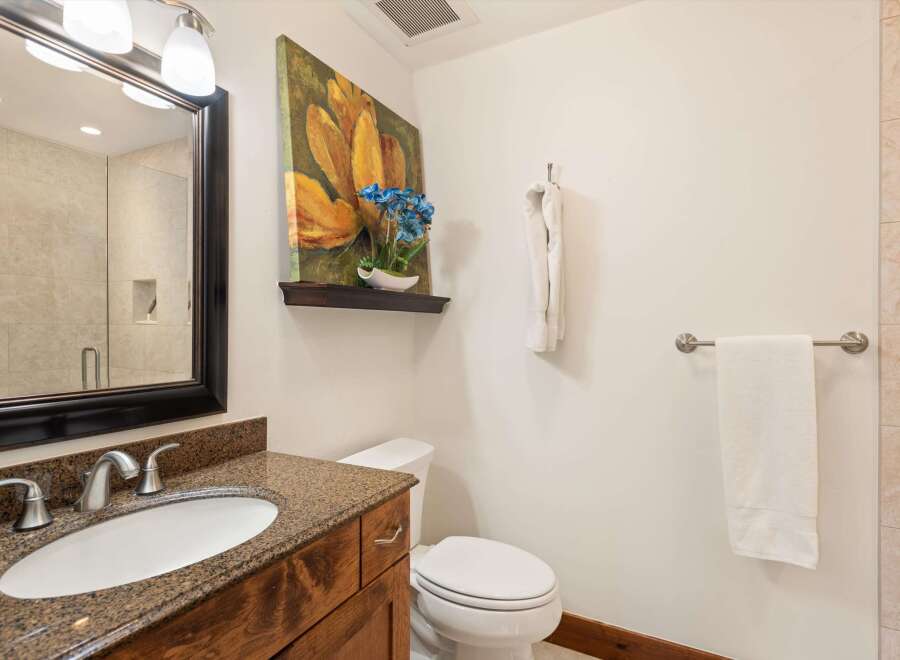 This stunning bathroom features a modern design with a touch of elegance.
