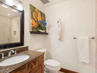 This stunning bathroom features a modern design with a touch of elegance.
