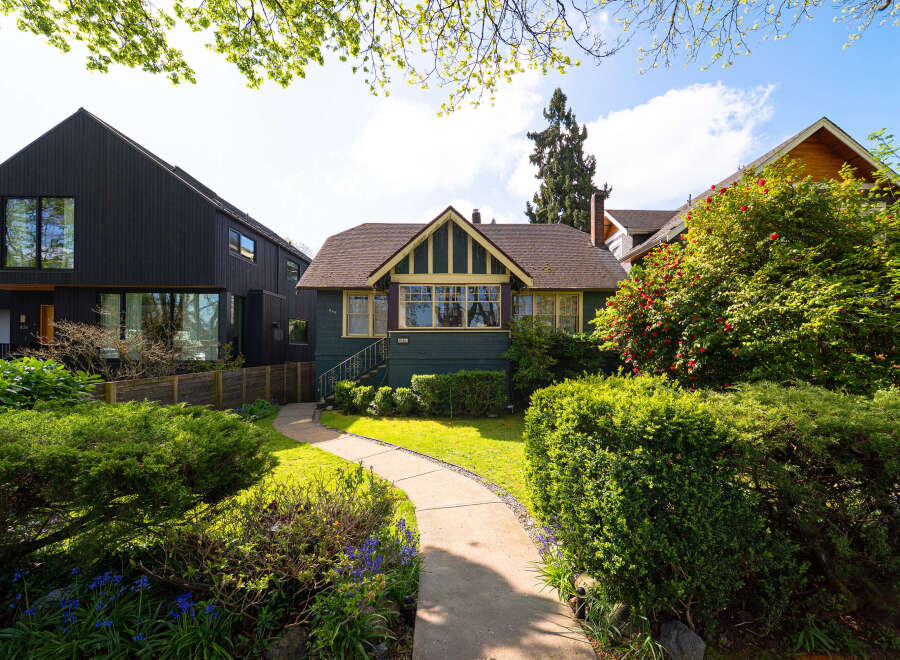 This charming home boasts a classic design with a welcoming facade.