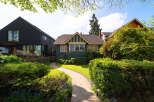 This charming home boasts a classic design with a welcoming facade.