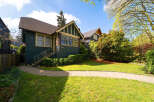This charming home boasts a classic design with a welcoming facade.