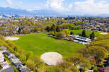 This stunning aerial view showcases a vibrant green park, perfect for outdoor activities and recreation.