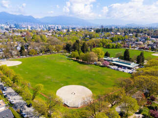 This stunning aerial view showcases a vibrant green park, perfect for outdoor activities and recreation.
