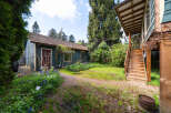 Discover the charm of this property, featuring a beautifully landscaped yard and a welcoming outdoor space.