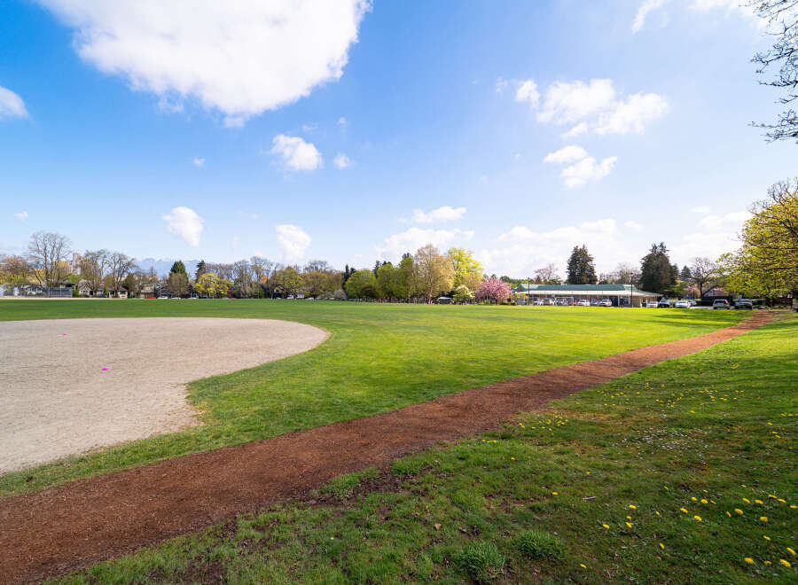 This stunning property boasts a sprawling green space, perfect for outdoor activities and relaxation.