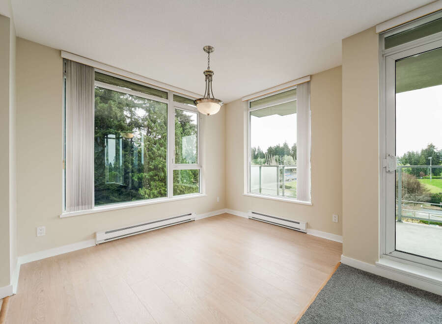 This stunning property boasts an abundance of natural light, thanks to its expansive windows.