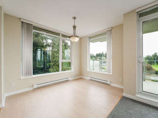 This stunning property boasts an abundance of natural light, thanks to its expansive windows.