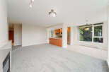 Step into modern elegance with this stunning property, featuring a spacious open-concept living area.