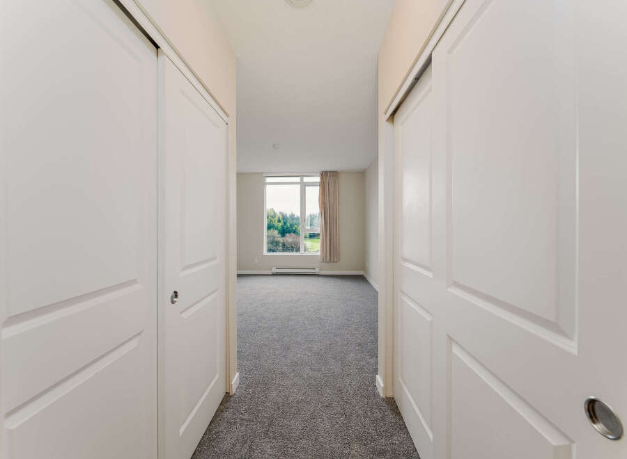 Step into this inviting space, featuring a bright and airy interior with a focus on natural light.