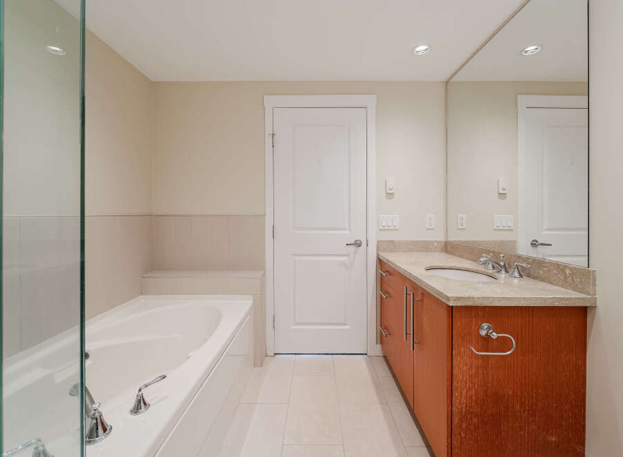 Step into a luxurious bathroom with a modern design.