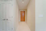 Step into this inviting entryway, showcasing a bright and airy atmosphere.