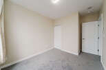 Step into this inviting bedroom, featuring a neutral color palette that offers a blank canvas for your personal style.