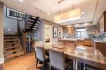 This stunning property boasts a modern kitchen with stainless steel appliances and granite countertops, perfect for culinary enthusiasts.