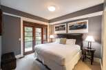 Step into luxury with this stunning bedroom featuring a cozy bed, perfect for a restful night's sleep.