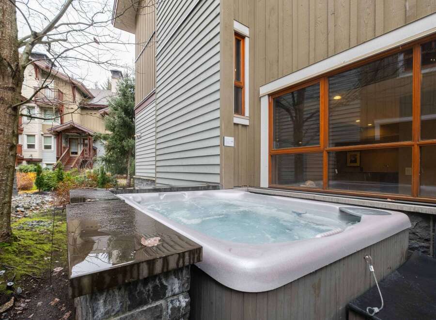 Relax and unwind in this luxurious hot tub, a perfect addition to this stunning property.