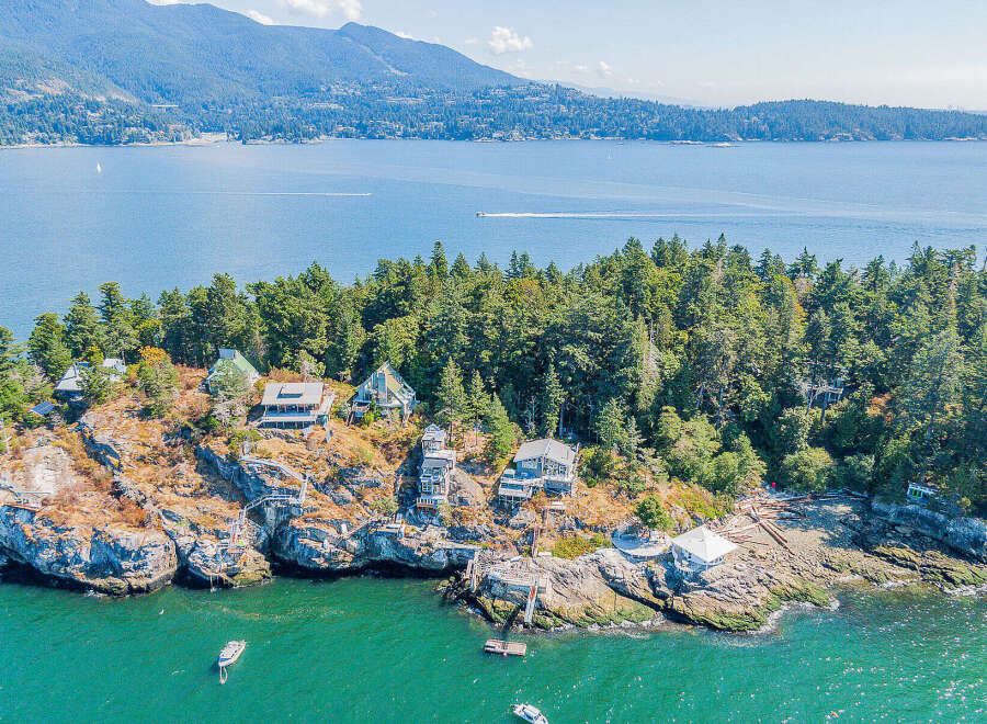 Discover a stunning waterfront property nestled on a private island, offering unparalleled views and tranquility.