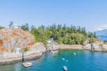 Discover a stunning waterfront property nestled on a rocky island, offering unparalleled privacy and breathtaking ocean views.
