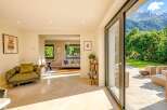 Experience luxury living with this stunning property, featuring an open-concept design that seamlessly blends indoor and outdoor spaces.