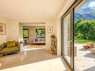 Experience luxury living with this stunning property, featuring an open-concept design that seamlessly blends indoor and outdoor spaces.