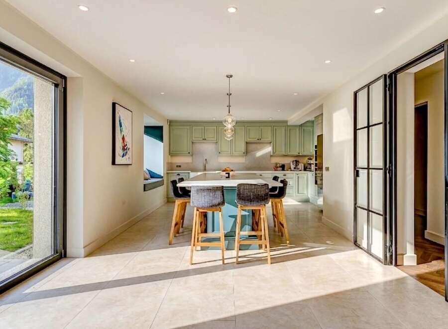 Step into luxury with this stunning kitchen! Featuring a spacious island, modern cabinetry, and ample natural light, this space is perfect for both cooking and entertaining.
