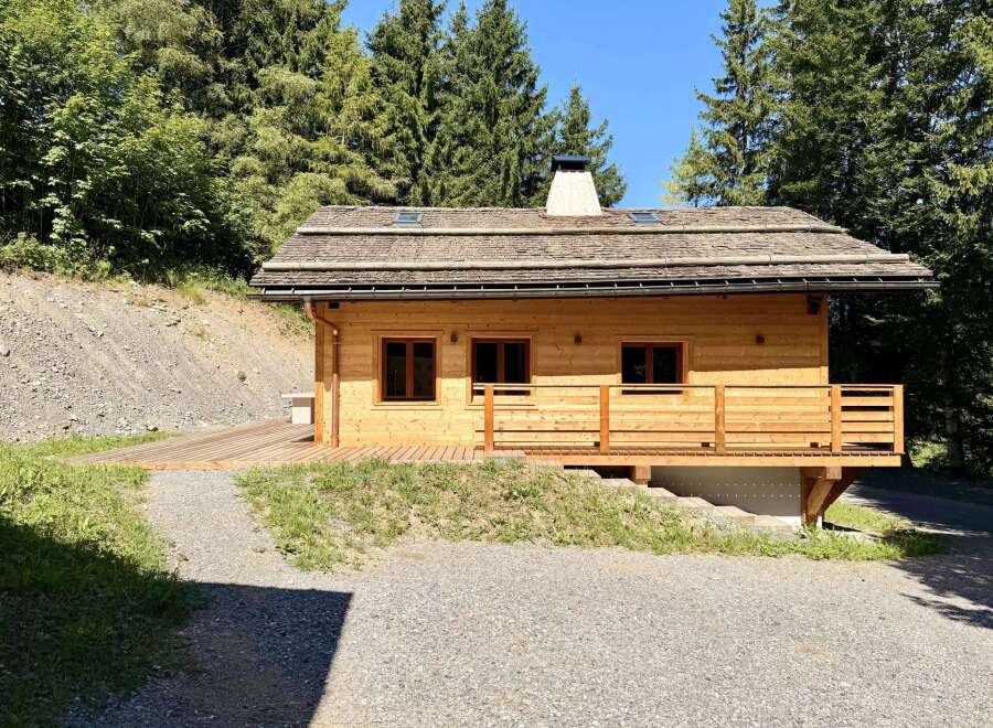 Discover a charming wooden cabin nestled in a serene natural setting.