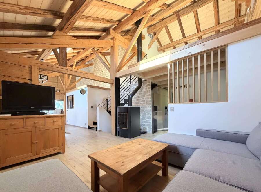 This stunning property boasts a unique blend of rustic charm and modern design.