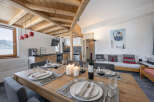 Experience the charm of this stunning property, featuring a beautifully designed dining area perfect for gatherings.