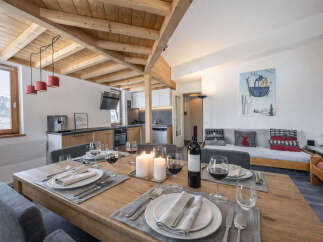 Experience the charm of this stunning property, featuring a beautifully designed dining area perfect for gatherings.