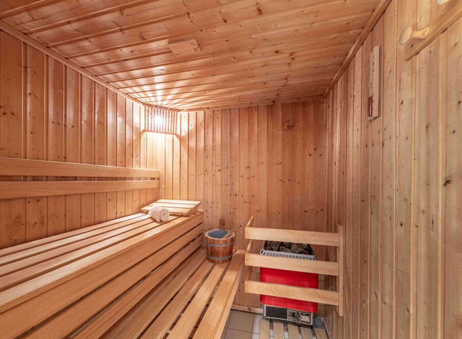 Step into relaxation with this inviting sauna.