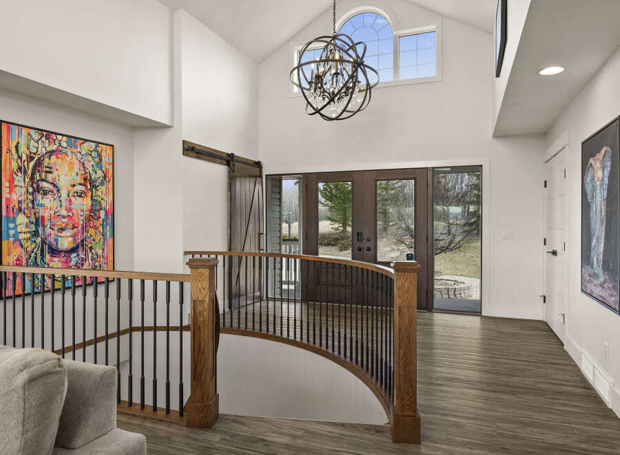 Step into luxury with this stunning property, featuring a grand entrance and exquisite architectural details.