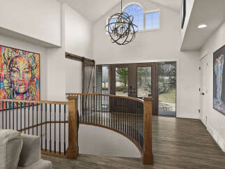 Step into luxury with this stunning property, featuring a grand entrance and exquisite architectural details.