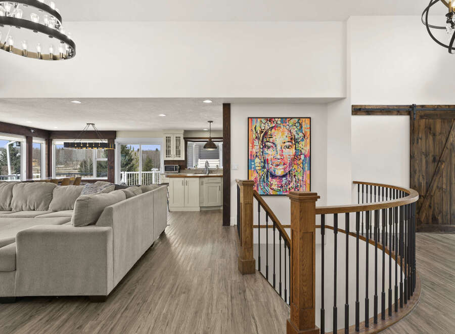Step into luxury with this stunning property featuring a spacious living area and a modern kitchen.