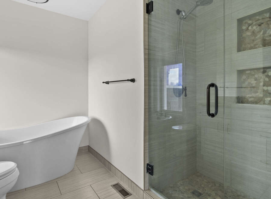 Step into a spa-like oasis with this luxurious bathroom.