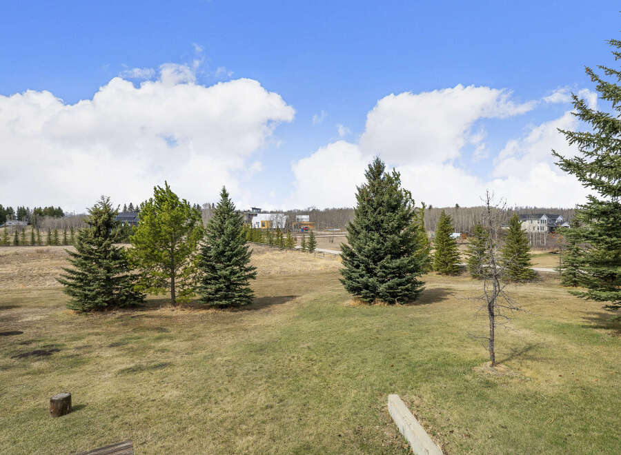 Enjoy the tranquility of this stunning property with lush greenery and mature trees.