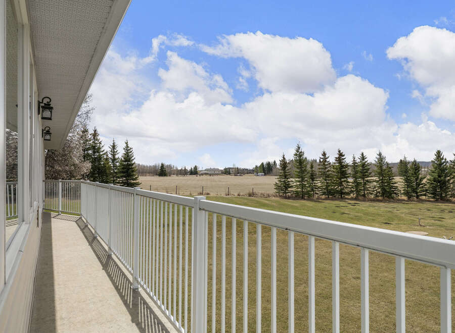 Enjoy breathtaking views from this stunning property! This home features a spacious balcony, perfect for relaxing and taking in the surrounding natural beauty.