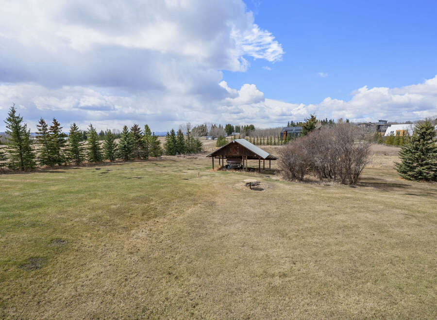 Discover the tranquility of this expansive property, perfect for those seeking a blend of nature and comfort.
