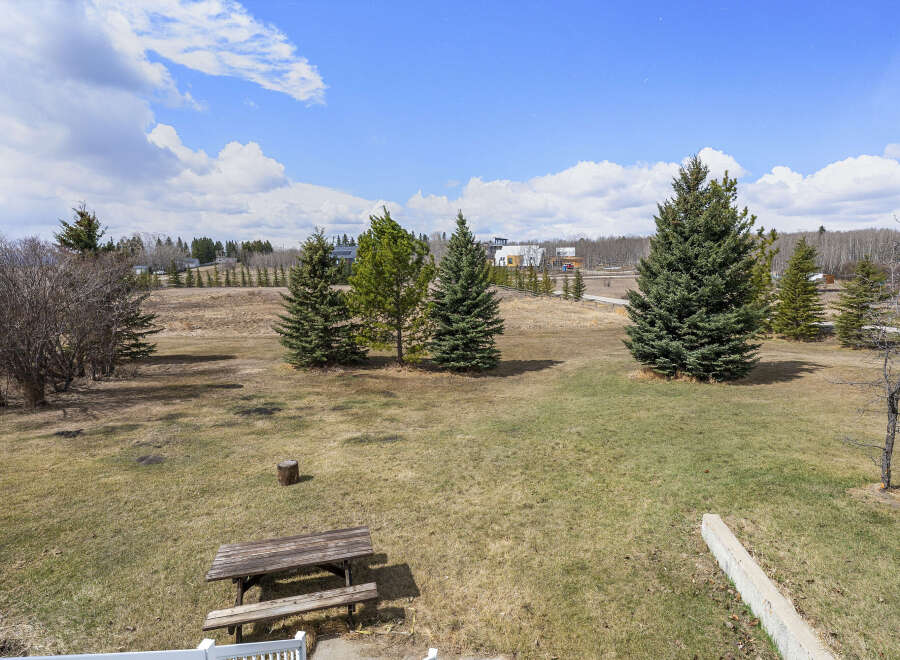 Enjoy the tranquility of this expansive property, perfect for outdoor activities and relaxation.