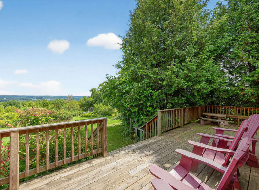 Enjoy breathtaking views from this stunning deck! This property features a spacious deck perfect for entertaining or relaxing.