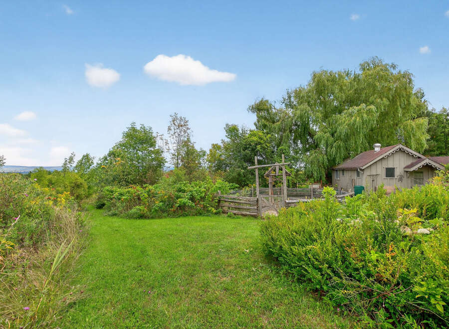 Discover a charming property nestled in a serene natural setting.