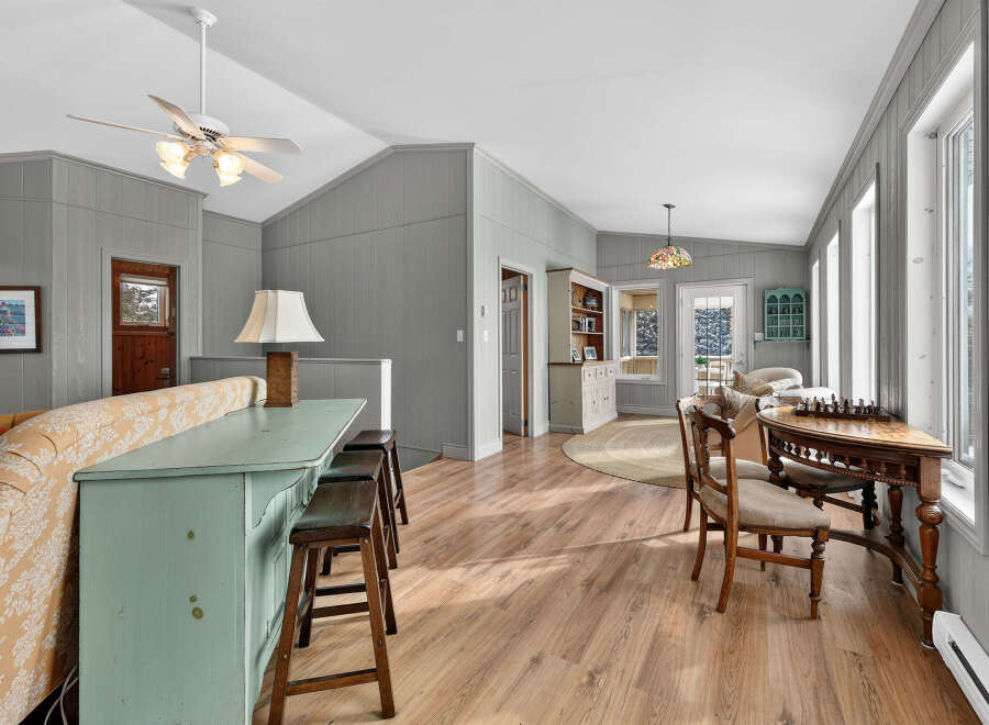 This charming property boasts a cozy interior with a unique blend of rustic and elegant elements.