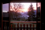 Wake up to breathtaking sunrise views from your private balcony, nestled in a serene mountain setting.