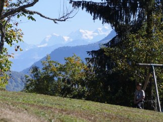 Mountain views and a tranquil setting enhance this property, which includes a grassy yard perfect for outdoor recreation.