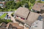 Discover this charming property nestled in a picturesque setting, featuring a beautifully tiled roof and a welcoming facade.