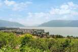 Enjoy breathtaking views of the lake and mountains from this stunning property.