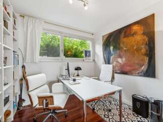 This stylish home office offers a bright and inspiring workspace.