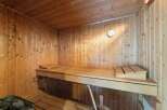 Step into relaxation with this inviting sauna.